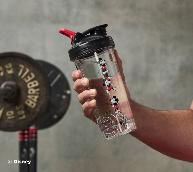 pro-series-d1 Mickey_Mouse_Protein_Shaker_Bottle_Being_Held_In_the_Gym.jpg